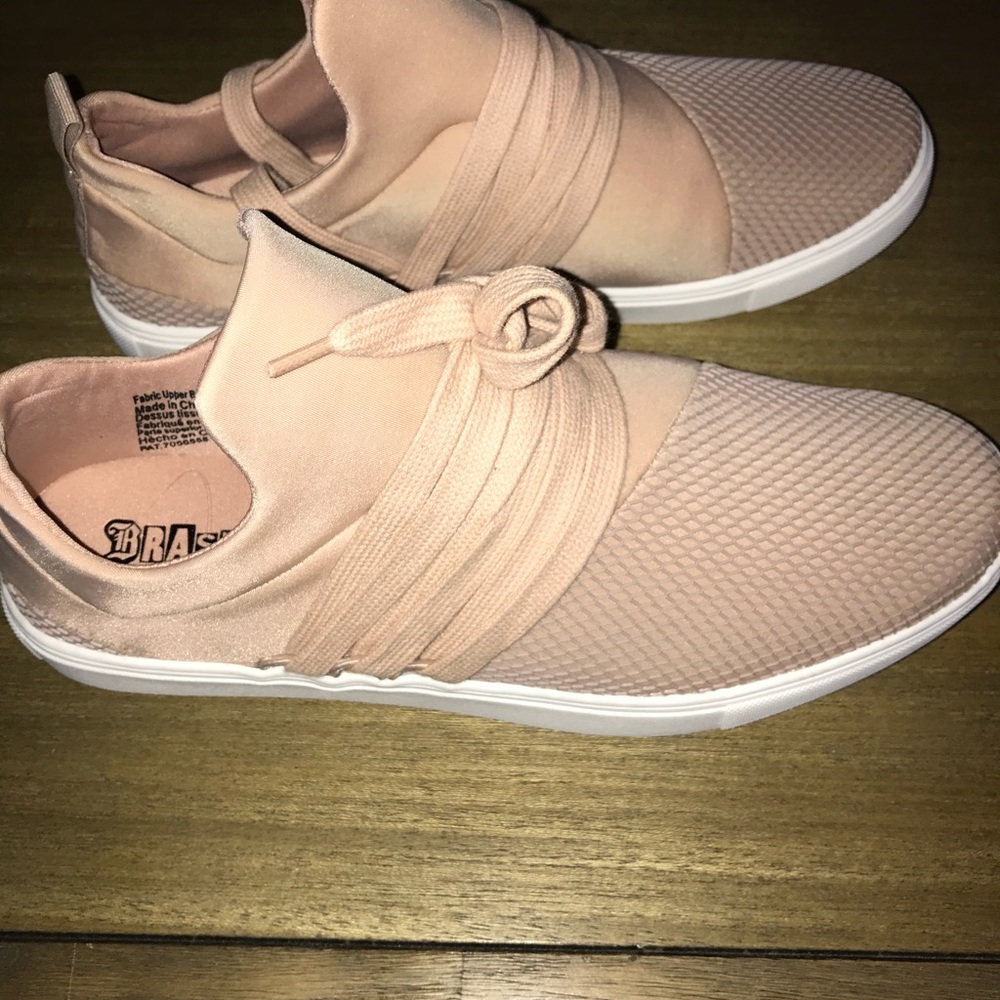 Pink tennis shoes.